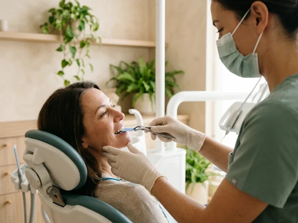 Dentist checking the bite on a new filling